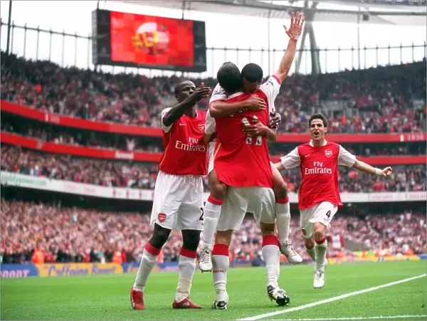 Robin van Persie celebrates scoring Arsenals 3rd goal his 2nd with Theo Walcott