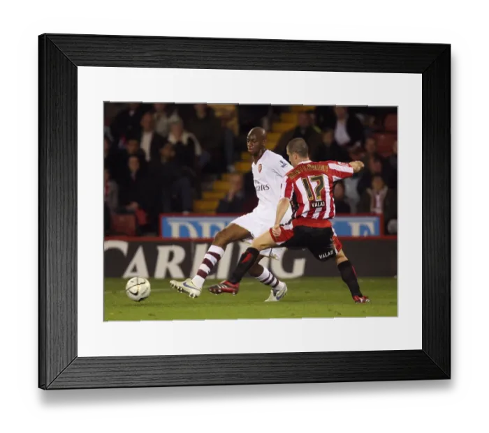 Framed Print : Abou Diaby's Stellar Performance: Arsenal Triumphs 3-0 over Sheffield United in Carling Cup