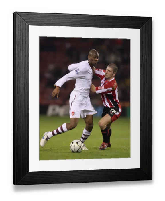 Framed Print : Abou Diaby (Arsenal) Nick Montgomery (Sheff) Framed Print : Abou Diaby (Arsenal) Nick Montgomery (Sheff)