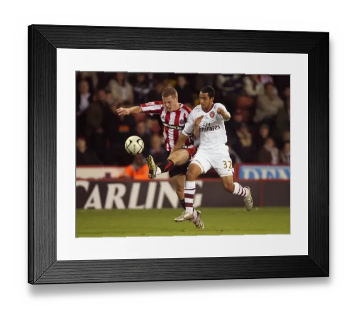 Framed Print : Theo Walcott (Arsenal) Chris Armstrong (Sheff) Framed Print : Theo Walcott (Arsenal) Chris Armstrong (Sheff)