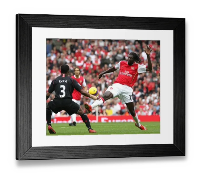 Framed Print : Clash of Titans: Adebayor vs. Evra in the Intense Arsenal vs. Manchester United Rivalry (3 / 11 / 2007) Framed Print : Clash of Titans: Adebayor vs. Evra in the Intense Arsenal vs. Manchester United Rivalry (3 / 11 / 2007)
