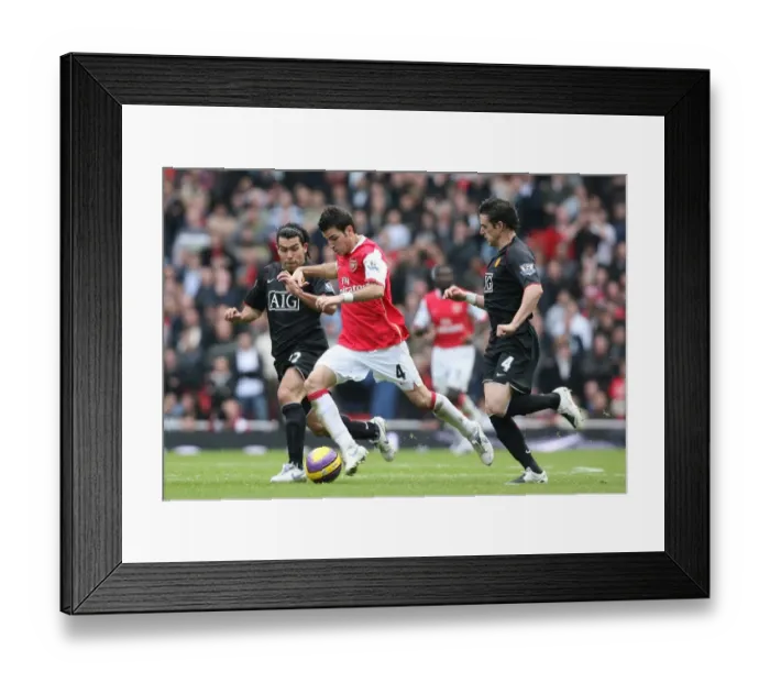 Framed Print : Cesc Fabregas (Arsenal) Carloz Tevez and Owen Hargreaves (Manchester United) Framed Print : Cesc Fabregas (Arsenal) Carloz Tevez and Owen Hargreaves (Manchester United)