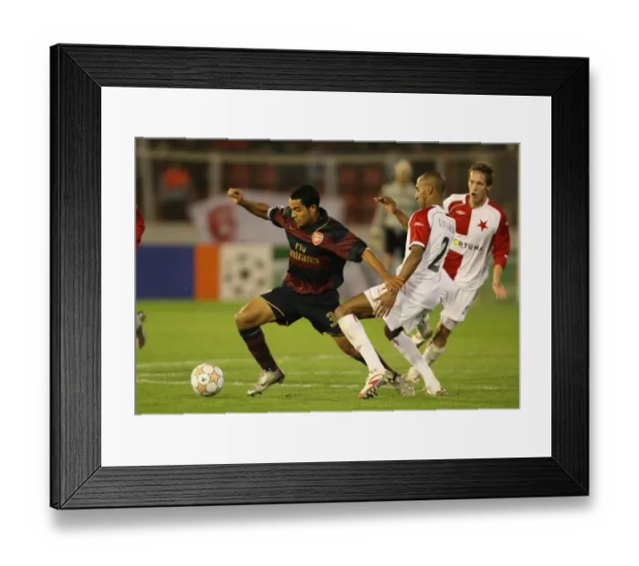 Framed Print : The Battle of Wings: Walcott vs. Tavares, Arsenal vs. Slavia Prague, UEFA Champions League, 2007 Framed Print : The Battle of Wings: Walcott vs. Tavares, Arsenal vs. Slavia Prague, UEFA Champions League, 2007