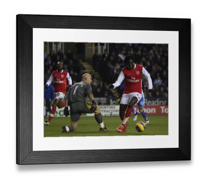 Framed Print : Emmanuel Adebayor rounds Reading goalkeeper Marcus Hahnemann to score but his goal is disalowed for off side Reading 1: 3 Arsenal, Barclays Premier League, Madejski Stadium, Reading, 12  /  11  /  2007. Credit : Stuart MacFarlane  /  Arsenal