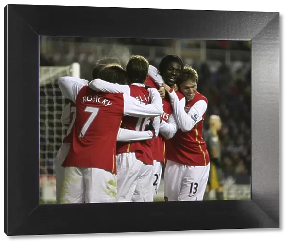 Arsenal's Thrilling 1000th Premier League Goal: Adebayor and Teamsmates Celebrate a 3-1 Victory over Reading
