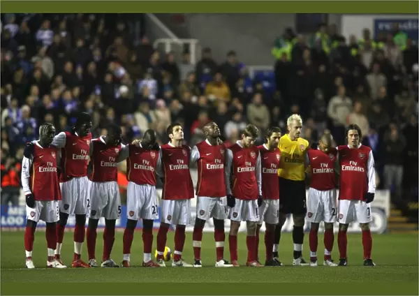 The Arsenal team line up for a minutes silence for Rememberance Day