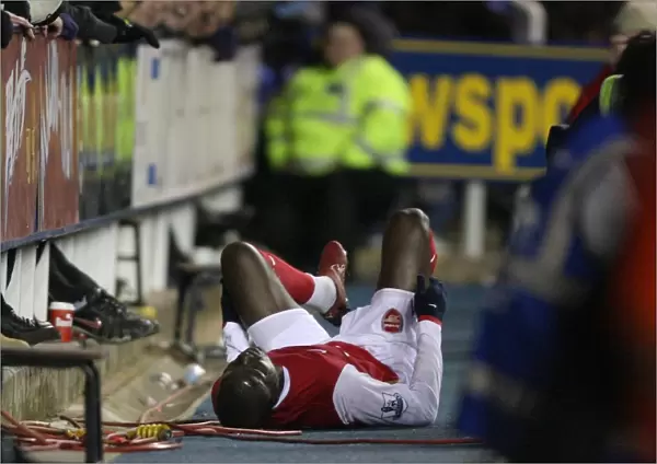 Injured Arsenal midfielder Emmanuel Eboue