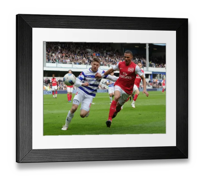 Framed Print : Arsenal's Kieran Gibbs Fends Off Jamie Mackie in Intense QPR Clash (2011-12)