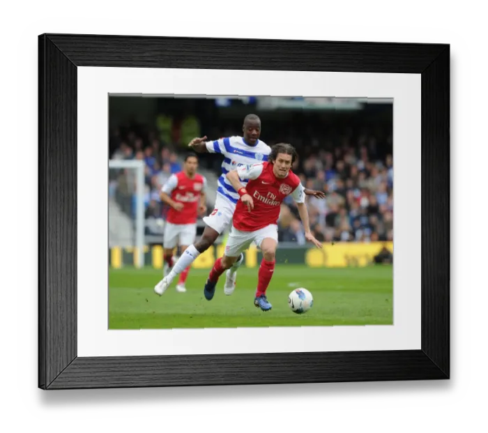 Framed Print : Arsenal's Tomas Rosicky Outmaneuvers QPR's Samba Diakite in Premier League Clash (2011-12)