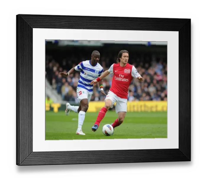 Framed Print : Rosicky vs. Diakite: Intense Battle in Queens Park Rangers vs. Arsenal Football Match, Premier League, 2012