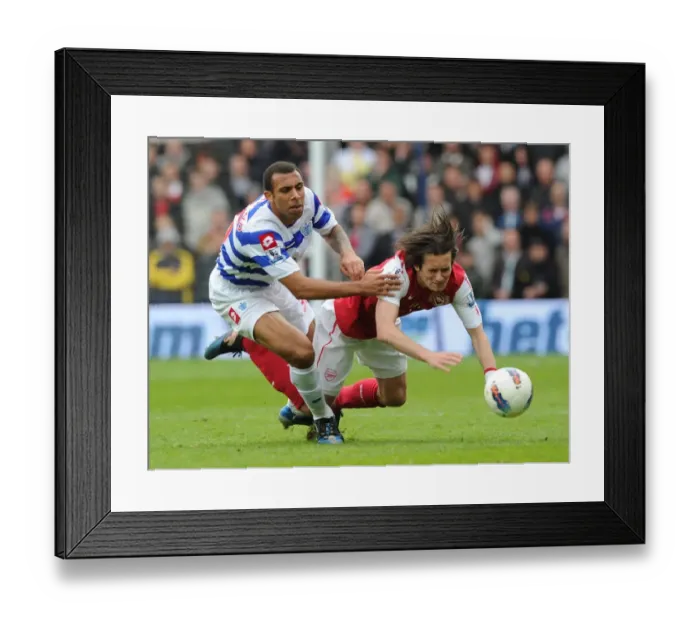 Framed Print : Rosicky vs. Ferdinand: Intense Clash in Queens Park Rangers vs. Arsenal Premier League Match Framed Print : Rosicky vs. Ferdinand: Intense Clash in Queens Park Rangers vs. Arsenal Premier League Match