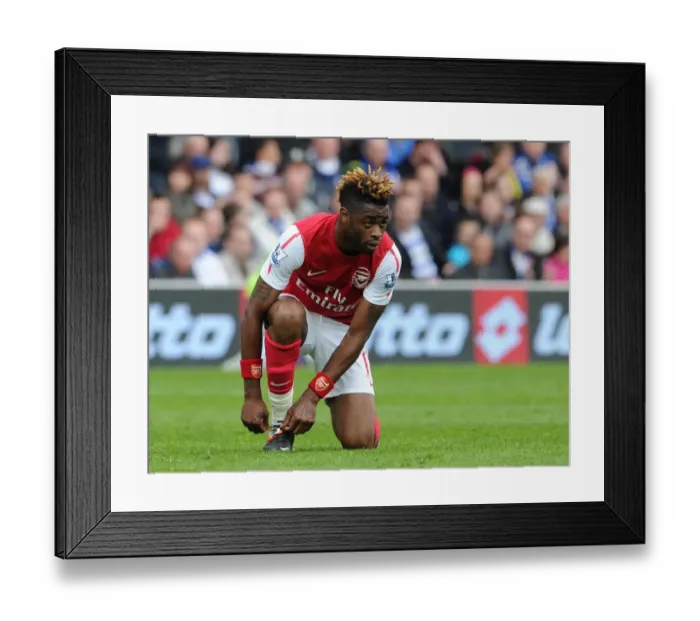 Framed Print : Alex Song (Arsenal). Queens Park Rangers 2: 1 Arsenal. Barclays Premier League