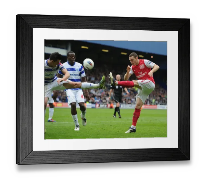Framed Print : Clash of Titans: Vermaelen vs. Barton - Queens Park Rangers vs. Arsenal, Premier League 2011-12