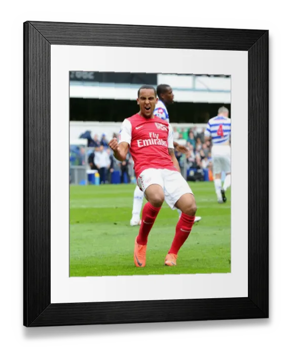 Framed Print : Theo Walcott's Euphoric Goal Celebration: Arsenal's Victory at Queens Park Rangers, Premier League 2011-12