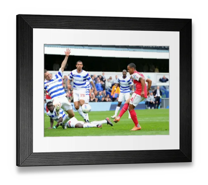 Framed Print : Theo Walcott Scores Dramatic Goal Past Clint Hill in Queens Park Rangers vs. Arsenal (2011-12) Framed Print : Theo Walcott Scores Dramatic Goal Past Clint Hill in Queens Park Rangers vs. Arsenal (2011-12)