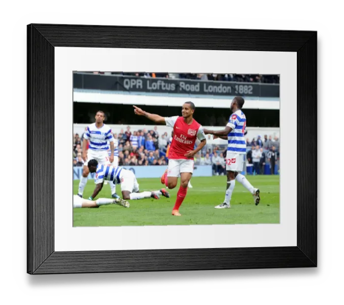 Framed Print : Theo Walcott's Thrilling Goal Celebration: Arsenal's Triumph at Queens Park Rangers, Premier League 2011-12 Framed Print : Theo Walcott's Thrilling Goal Celebration: Arsenal's Triumph at Queens Park Rangers, Premier League 2011-12