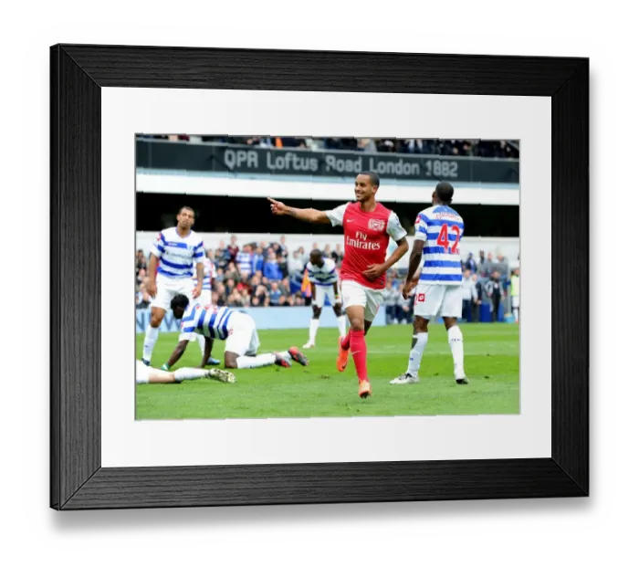 Framed Print : Theo Walcott's Euphoric Goal Celebration: Arsenal's Victory at Queens Park Rangers, Premier League 2011-12 Framed Print : Theo Walcott's Euphoric Goal Celebration: Arsenal's Victory at Queens Park Rangers, Premier League 2011-12