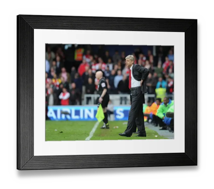 Framed Print : Arsene Wenger: Unwavering Focus Before Queens Park Rangers Clash (2011-12)