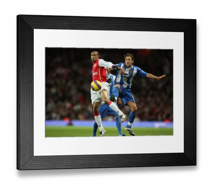 Framed Print : Gael Clichy (Arsenal) Michael Brown (Wigan) Framed Print : Gael Clichy (Arsenal) Michael Brown (Wigan)