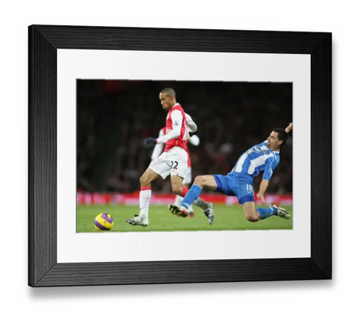 Framed Print : Gael Clichy (Arsenal) Paul Scharner (Wigan) Framed Print : Gael Clichy (Arsenal) Paul Scharner (Wigan)