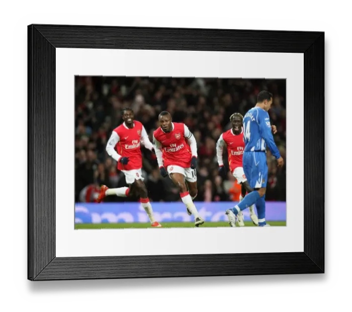 Framed Print : Thrilling Gallas Goal: Arsenal Takes 2-0 Lead Over Wigan Athletic in Premier League Framed Print : Thrilling Gallas Goal: Arsenal Takes 2-0 Lead Over Wigan Athletic in Premier League