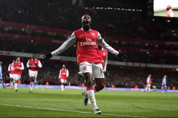 Gallas's Thrilling Goal: Arsenal Takes a 2-0 Lead Over Wigan Athletic in the Premier League