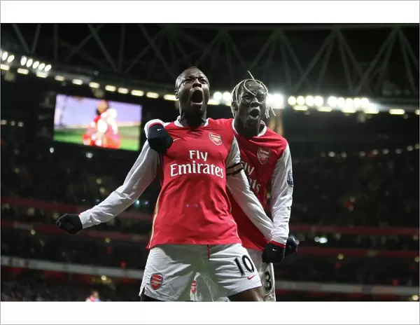 William Gallas celebrates scoring Arsenals 1st goal with Bacary Sagna