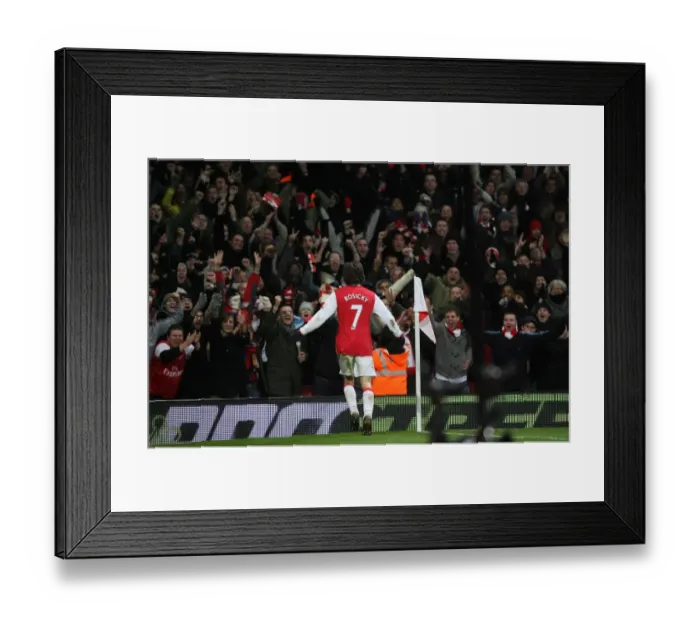 Framed Print : Tomas Rosicky's Thrilling Goal: Arsenal Fans Go Wild as Gunners Lead 2:0 Over Wigan Athletic Framed Print : Tomas Rosicky's Thrilling Goal: Arsenal Fans Go Wild as Gunners Lead 2:0 Over Wigan Athletic