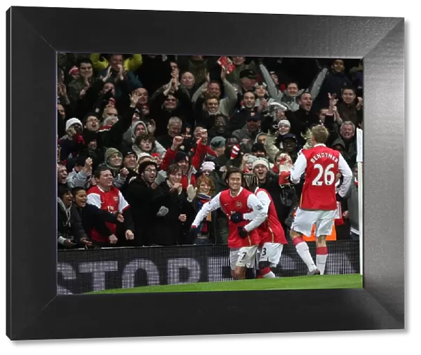 Tomas Rosicky celebrates scoring Arsenals 2nd goal with Bacary Sagna and the fans