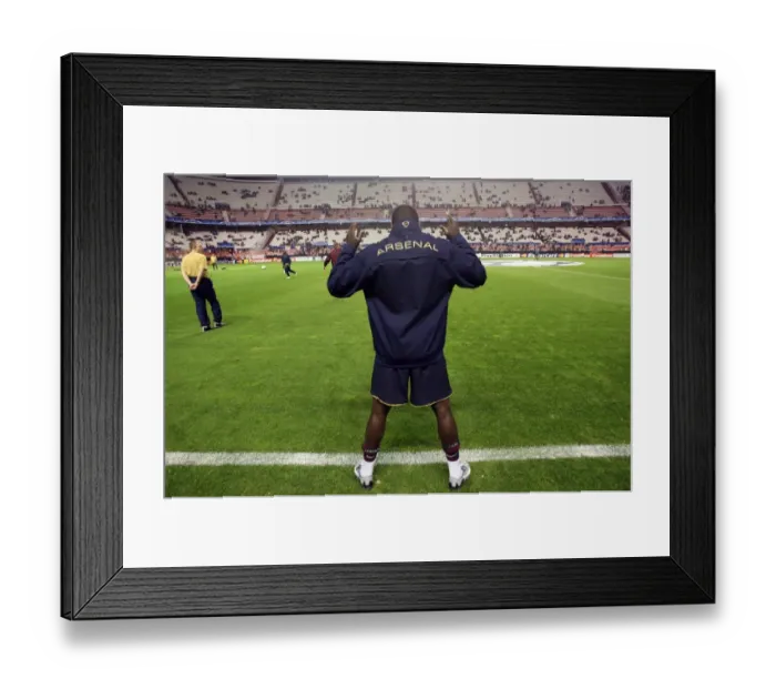 Framed Print : Emmanuel Eboue: Seville Triumph, Arsenal's 3-1 Victory in Champions League Group H Framed Print : Emmanuel Eboue: Seville Triumph, Arsenal's 3-1 Victory in Champions League Group H