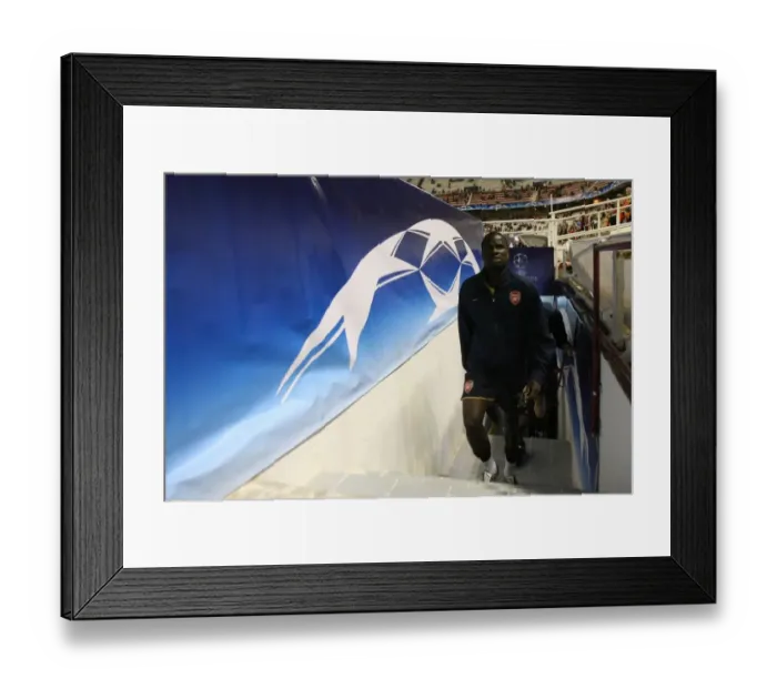 Framed Print : Emmanuel Eboue: Seville Victory in Champions League Group H (3:1 vs Sevilla)