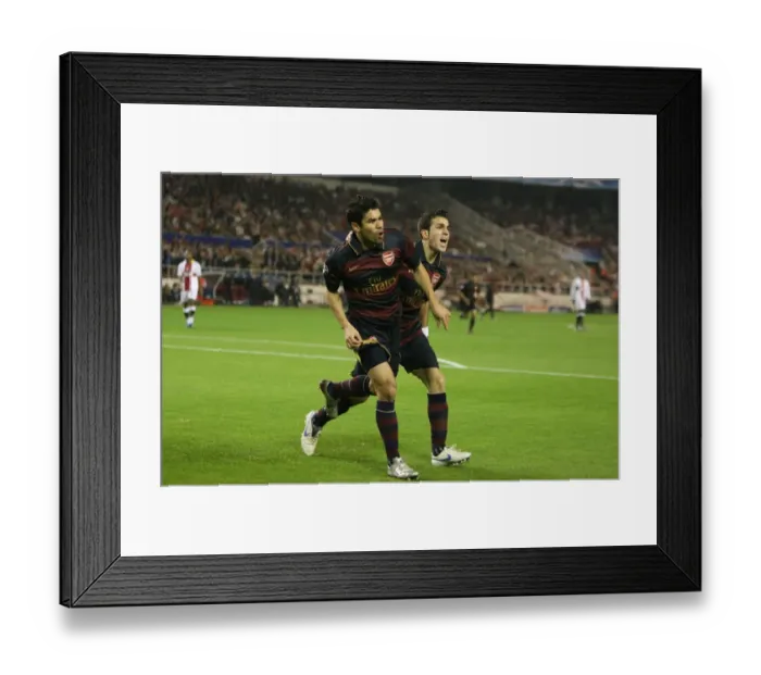Framed Print : Eduardo and Cesc Fabregas: Celebrating Arsenal's Goal in Seville, UEFA Champions League (3:1)
