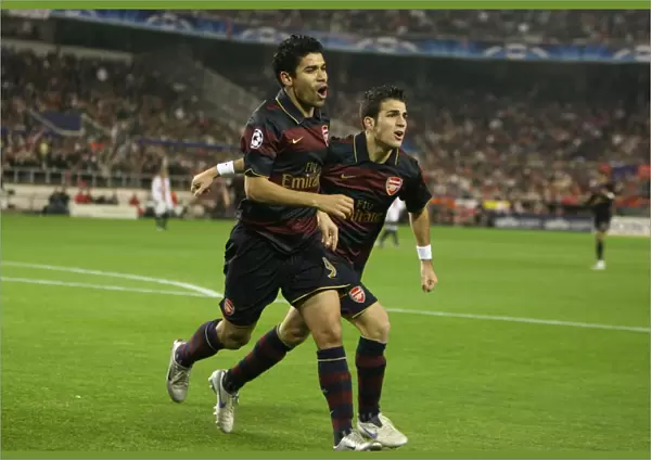 Eduardo celebrates scoring the Arsenal goal with Cesc Fabregas