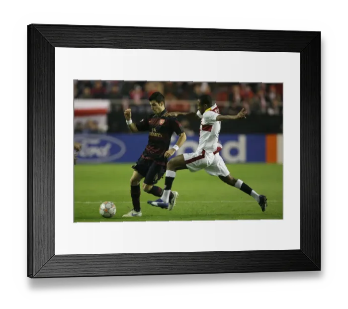 Framed Print : Cesc Fabregas (Arsenal) Seydou Keita (Seville) Framed Print : Cesc Fabregas (Arsenal) Seydou Keita (Seville)