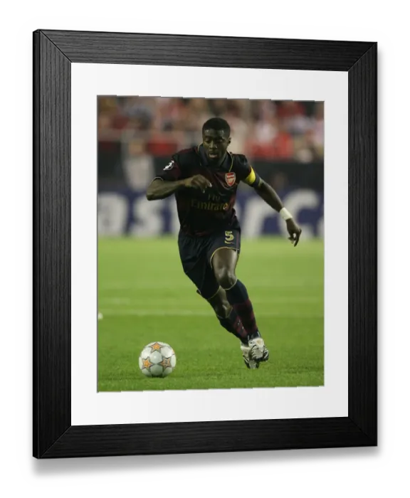 Framed Print : Kolo Toure's Triumph: Arsenal's 3-1 Victory Over Sevilla in the UEFA Champions League, 2007