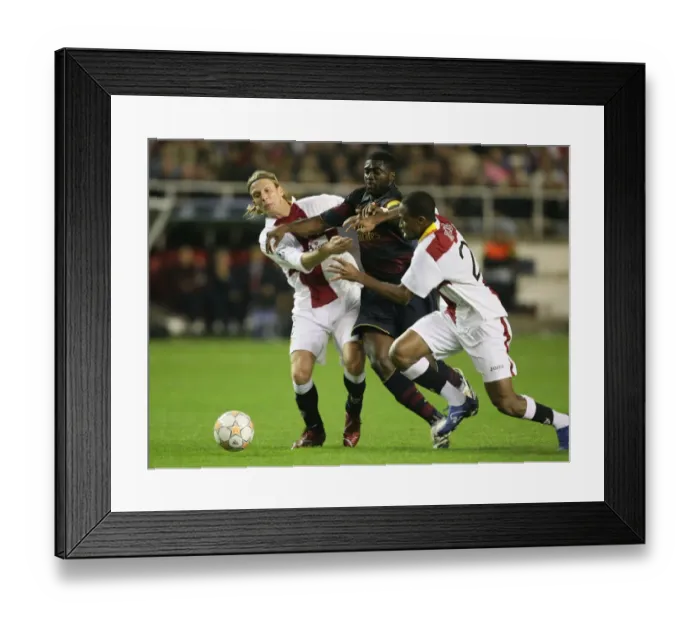 Framed Print : Kolo Toure (Arsenal) Seydou Keita & Christian Poulsen(Seville) Framed Print : Kolo Toure (Arsenal) Seydou Keita & Christian Poulsen(Seville)