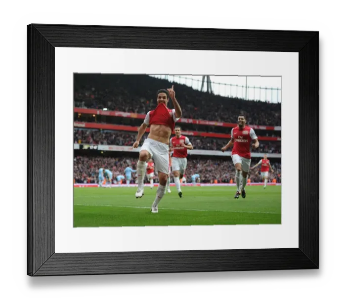 Framed Print : Mikel Arteta's Game-Winning Goal: Arsenal's Triumph Over Manchester City (2011-12)