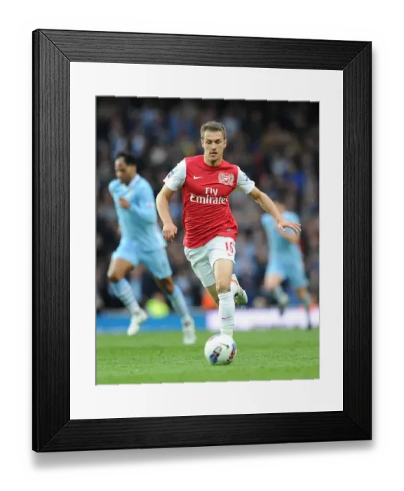 Framed Print : Aaron Ramsey in Action: Arsenal vs Manchester City, Premier League 2011-12 Framed Print : Aaron Ramsey in Action: Arsenal vs Manchester City, Premier League 2011-12
