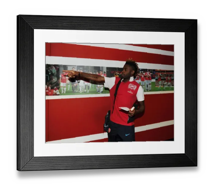Framed Print : Arsenal vs Manchester City: Alex Song's Determined Stance at Emirates Stadium (2011-12)