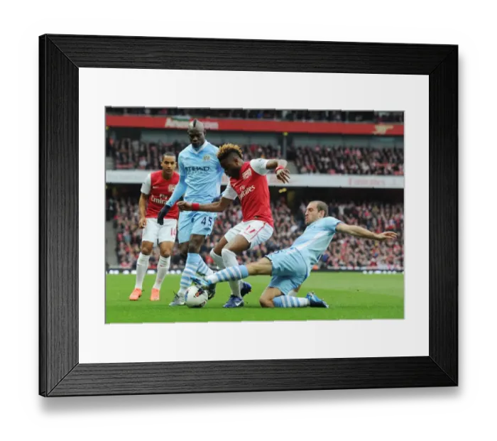 Framed Print : Clash of Titans: Song vs. Balotelli & Zabaleta - Arsenal vs. Manchester City, Premier League Framed Print : Clash of Titans: Song vs. Balotelli & Zabaleta - Arsenal vs. Manchester City, Premier League