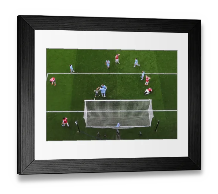 Framed Print : Arsenal's Frustration: Vermaelen and Benayoun Reaction after Missed Opportunities against Manchester City (2011-12)