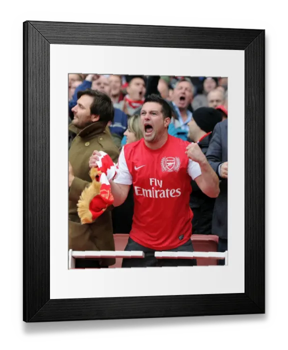 Framed Print : Arsenal Fan Celebrates Goal Against Manchester City - Premier League 2011-12 Framed Print : Arsenal Fan Celebrates Goal Against Manchester City - Premier League 2011-12