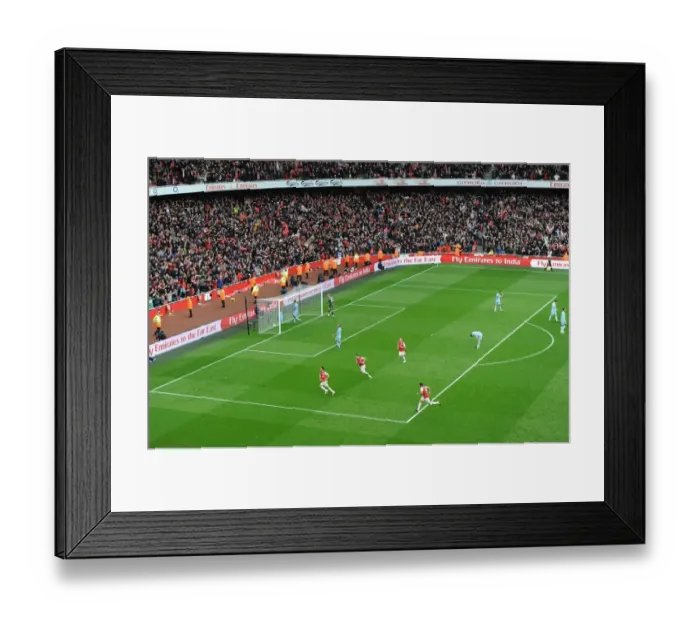 Framed Print : Mikel Arteta's Game-Winning Goal: Arsenal's Triumph over Manchester City (2011-12)