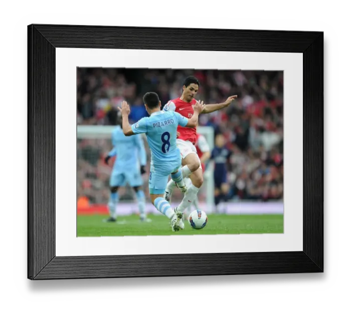 Framed Print : Mikel Arteta takes the ball off David Pizzaro (Man City) before scoring Arsenals goal Framed Print : Mikel Arteta takes the ball off David Pizzaro (Man City) before scoring Arsenals goal