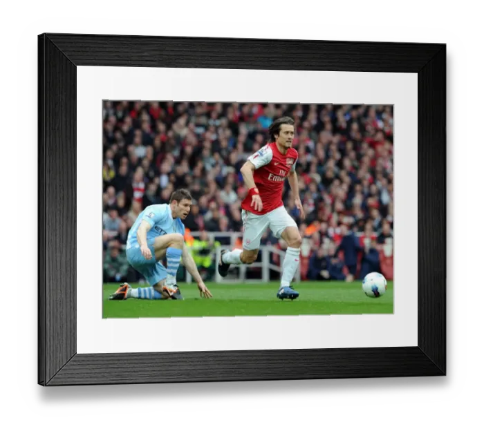 Framed Print : Arsenal's Tomas Rosicky Outruns Manchester City's James Milner in Premier League Clash
