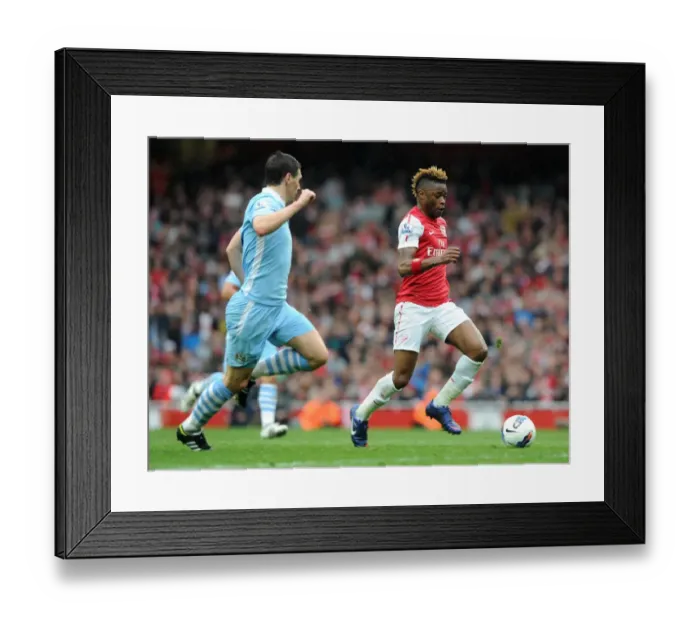 Framed Print : Alex Song (Arsenal) Gareth Barry (Man City). Arsenal 1: 0 Manchester City Framed Print : Alex Song (Arsenal) Gareth Barry (Man City). Arsenal 1: 0 Manchester City