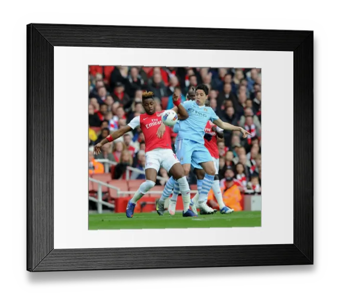 Framed Print : Alex Song (Arsenal) Samir Nasri (Man City). Arsenal 1: 0 Manchester City Framed Print : Alex Song (Arsenal) Samir Nasri (Man City). Arsenal 1: 0 Manchester City