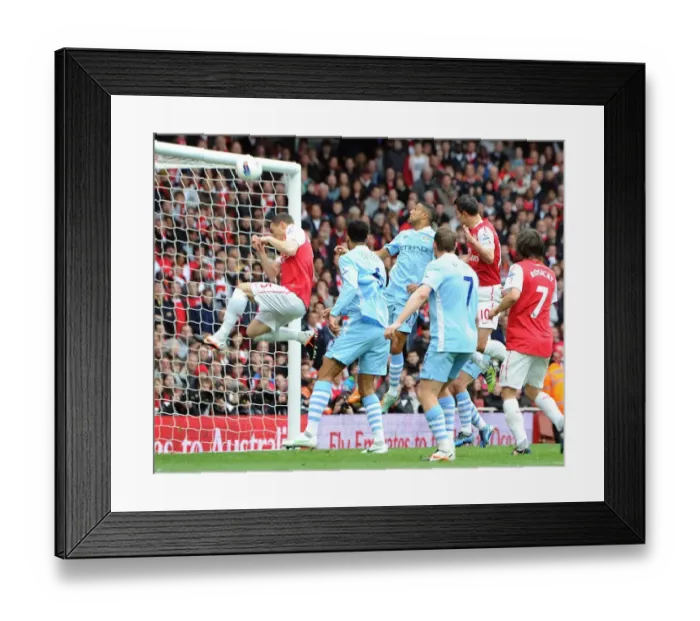 Framed Print : Thomas Vermaelen accidentally blocks Robin van Persie (Arsenal) goal bound header