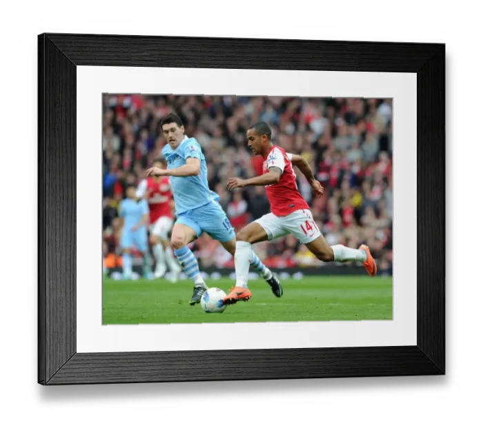 Framed Print : Theo Walcott vs. Gareth Barry: Battle at Emirates Stadium (Arsenal v Manchester City, 2011-12)