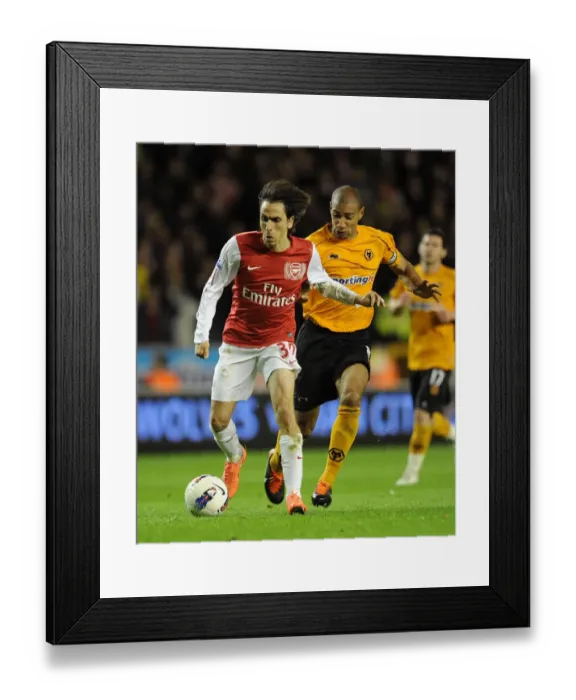 Framed Print : Yossi Benayoun vs. Carl Henry: Intense Rivalry at Molineux - Arsenal vs. Wolverhampton Wanderers, Premier League, 2011-2012 Framed Print : Yossi Benayoun vs. Carl Henry: Intense Rivalry at Molineux - Arsenal vs. Wolverhampton Wanderers, Premier League, 2011-2012